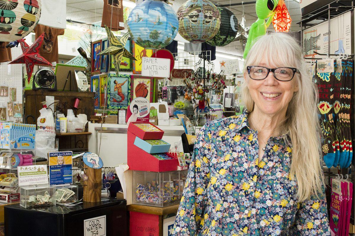 Carol Powers, owner of Heartworks, poses for a photo May 19 amongst various items available at her shop.Photo by: Robert Black