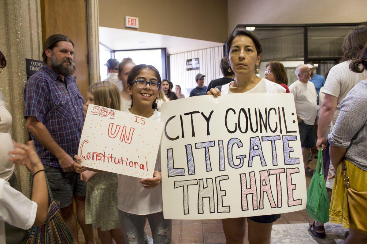 Residents+urge+San+Marcos+City+Council+to+take+a+stance+against+Senate+Bill+4.Photo+by+Bri+Watkins