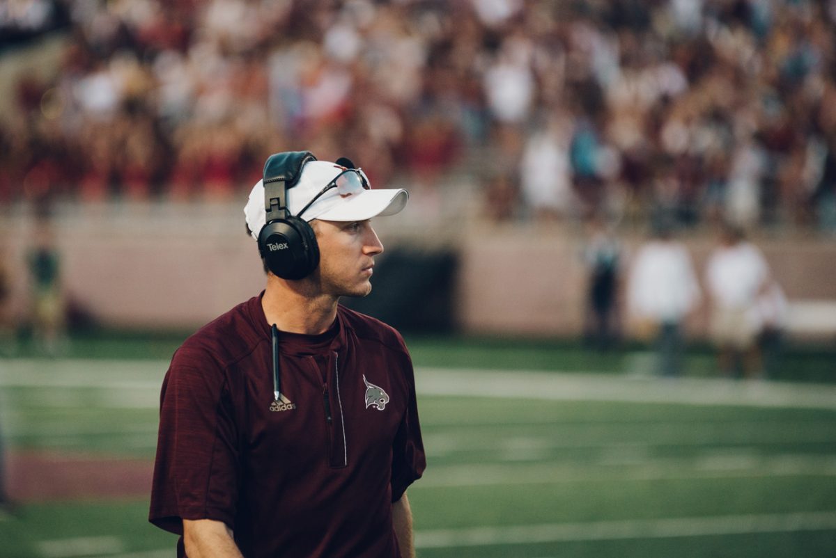 Parker Gleming, quarterback coach, during the game against UTSA at Bobcat Stadium.Photo by Kirby Crumpler | Staff Photographer