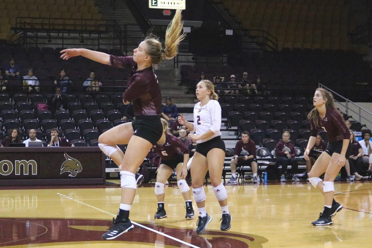 Megan+Porter%2C+sophomore+outside+hitter%2C+spikes+the+ball+Sept.+9+during+the+game+against+UMass+Lowell+at+Strahan+Colosseum.Photo+by+Lara+Dietrich+%7C+Multimedia+Editor