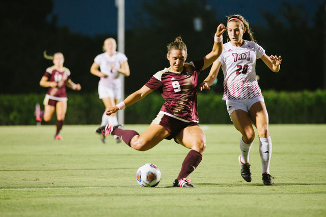 Kassi Hormuth, senior forward for Texas State, attempts to make a goal during the first half of Texas State’s 4-2 win over Troy University. This win now puts the soccer team at seven consecutive wins.Photo by Kirby Crumpler>