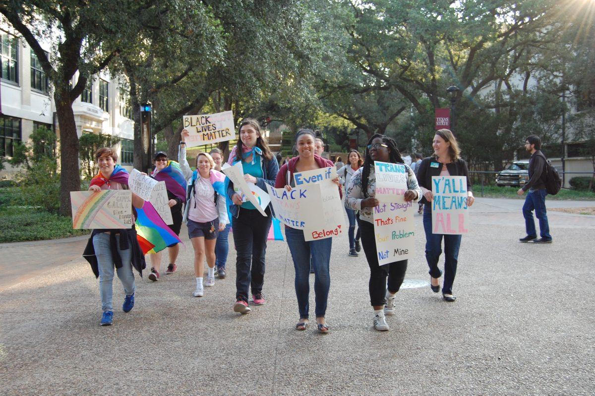Students march from Old Main to the President’s House Oct. 11 for National Coming Out Day.Photo by Connor Brown | Assistant News Editor
