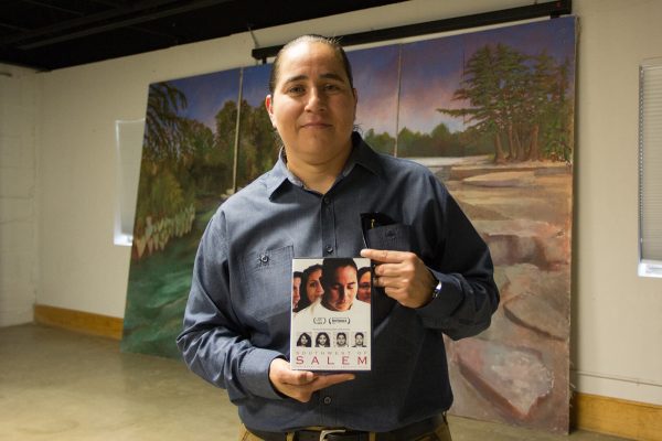 Anna Vasquez, a member of the San Antonio 4, poses for a photo Nov. 5 holding a copy of “Southwest of Salem,” the film based on her imprisonment and exoneration. The film was shown during the Lost River Film Fest in San Marcos.
Photo by Lara Dietrich | Multimedia Editor