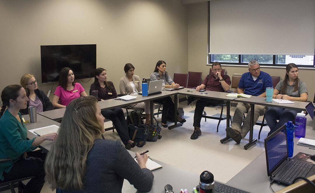 Graduate students and faculty meet Nov. 27 in FCS room 177 discussing the Food Pantry that opens February 2018. The Food Pantry will help out students who are food insecure.
Photo by Hannah Felske | Staff Photographer