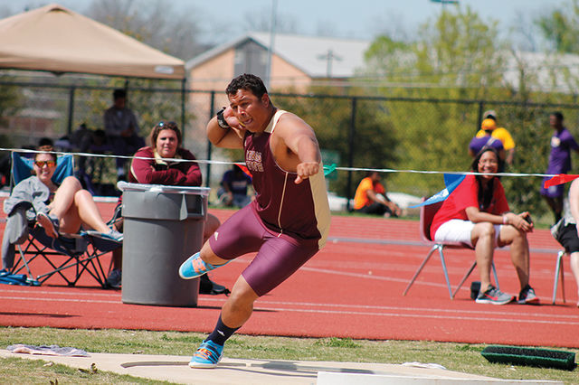 Jordan Huckaby thrower throws shot put at a track meet from a past season.
Star File Photo