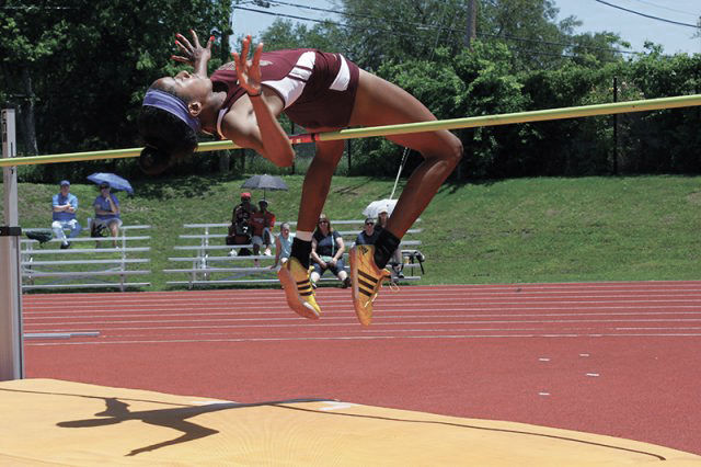 A high jumper from the women’s track and field team vaults herself over the pole.
Star File Photo