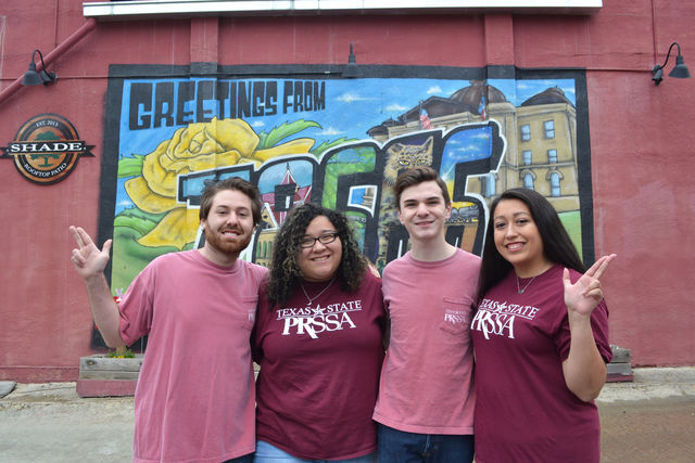 President Alana Zamora of Texas State’s PRSSA chapter poses for a photo with members in front of a downtown mural.
Photo courtesy of Alana Zamora.