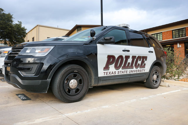 A Texas State police vehicle sits in a lot across from Retama Hall.
Photo by Tyler Jackson | Multimedia Editor