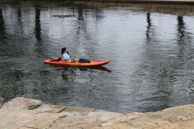 Volunteer on a Kayaking searching for trash in the river.
Photo by Paola Quiroz
 | Lifestyle Reporter