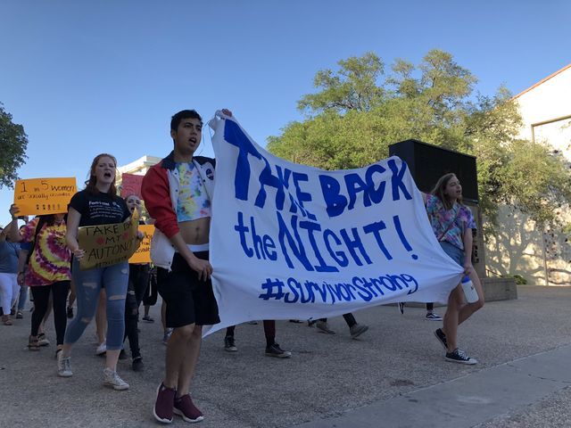 Students march together with signs and banners displaying solidarity against sexual violence, April 23.
Photo by 
Diana Furman | Lifestyle Reporter