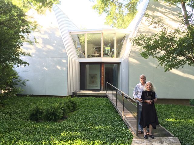 Jene and Jean Laman stand outside their recently renovated home.
Photo by 
Diana Furman | Lifestyle Reporter
