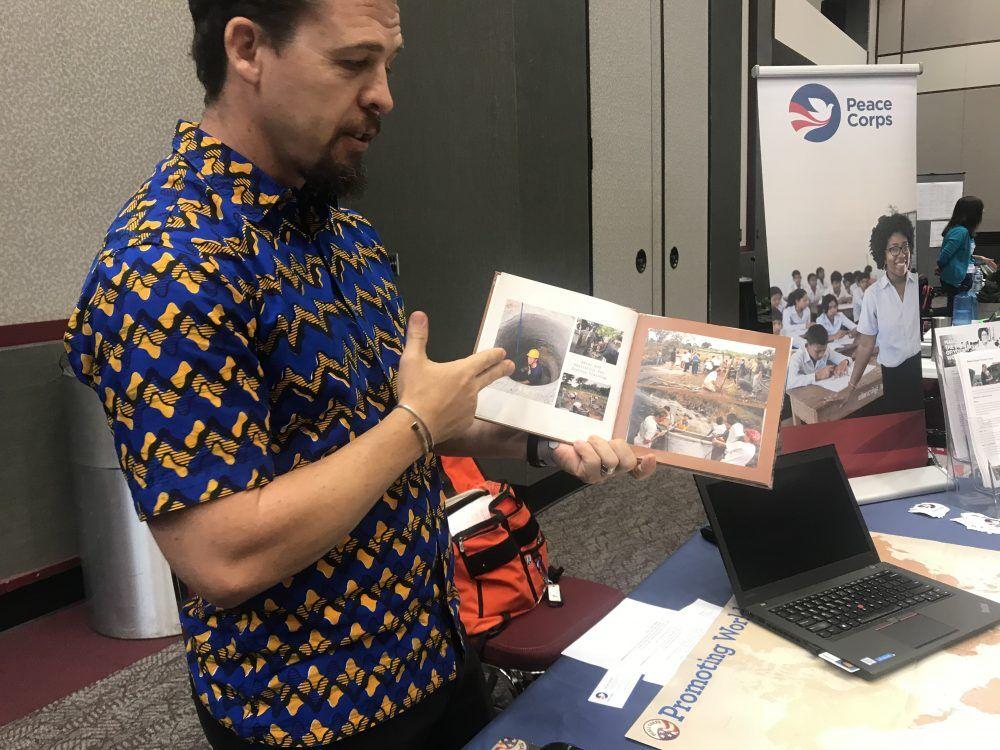 
Brendan Canvanagh, regional Peace Corps recruiter, presents photo album to students Oct. 2.


Photo By Lilith Osburn-Cole

