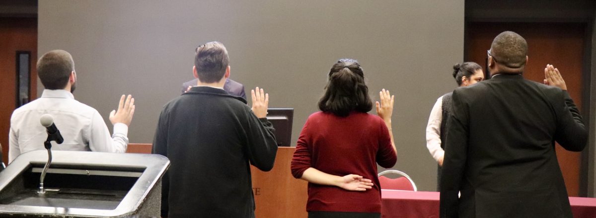 The new chief of justice and associate justices were sworn in at the Student Government meeting Nov. 12.Photo by Kaiti Evans