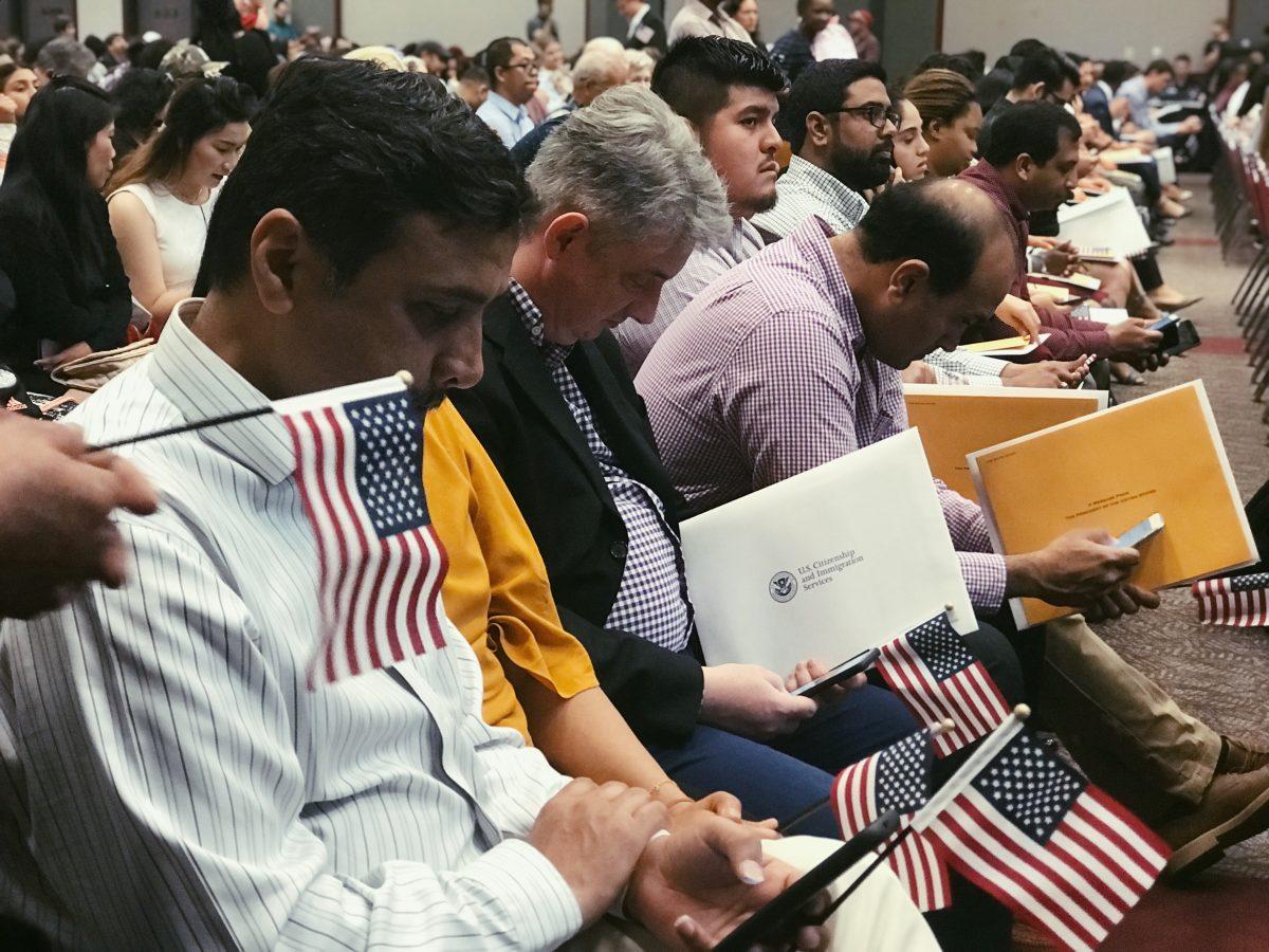 March 26, immigrants became American citizens.Photo by Laura Montelongo