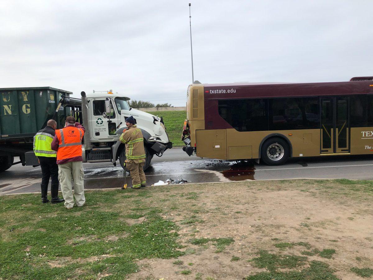 A recycling bus rear-ends a Texas State bus.Photo by Carissa Castillo