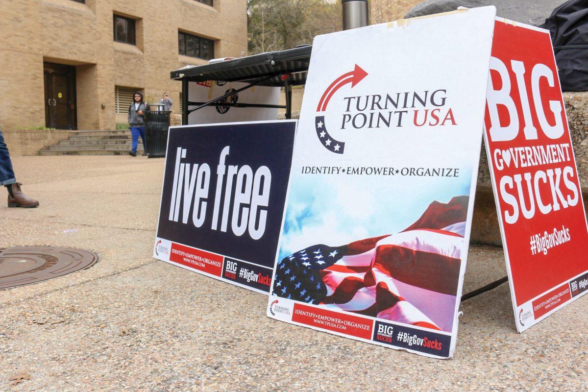 Turning Point USA posters sit March 1 near the free speech stallions.Photo by Jaden Edison