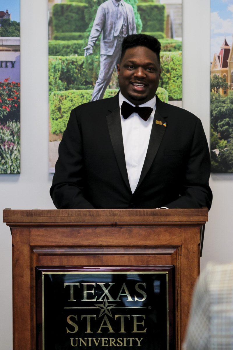 Student Government President Corey Benbow gives his inauguration speech April 17 at the Student Government presidential and vice presidential inauguration in the LBJ Student Center.