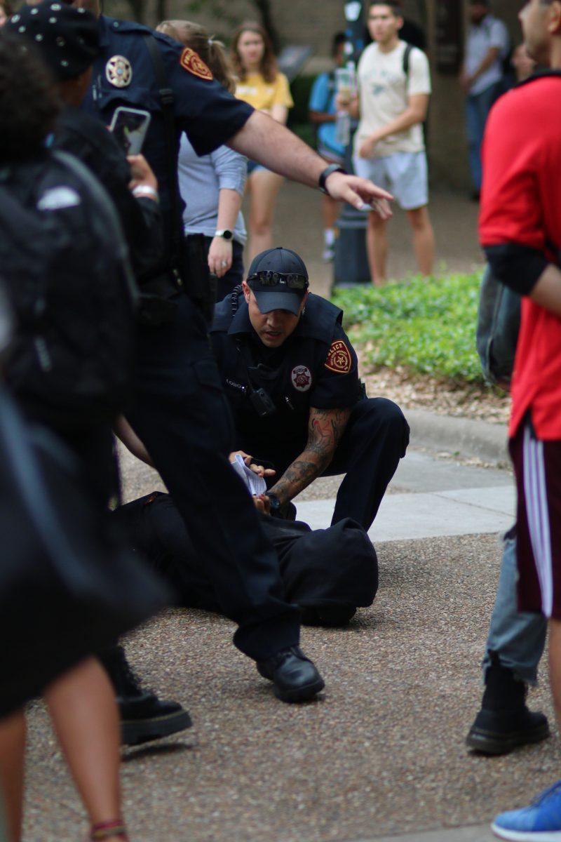 University Police Department officers make one of four arrests, Wednesday, May 1, 2019, near the Evans Liberal Arts Building following an altercation with counter-protesters who gathered in anticipation of the arrival of the Texas Nomads SAR, a group that announced via social media it was coming to campus to hold a demonstration in opposition to Student Government’s proposed TPUSA ban.[Photo by Chinedu Chukuka]