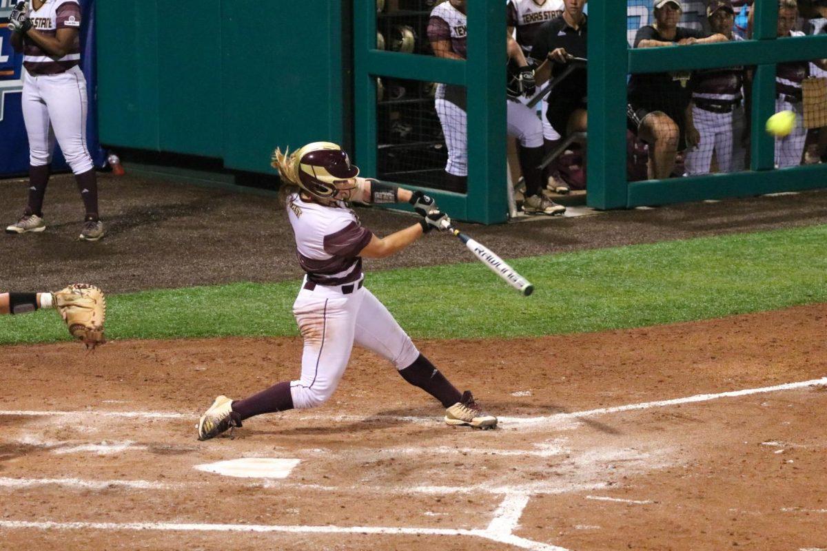Texas State’s Tara Oldtmann swings and hits the ball, Wednesday, May 8, 2019, in a game against the University of Louisiana-Monroe. [Photo by Kate Connors]