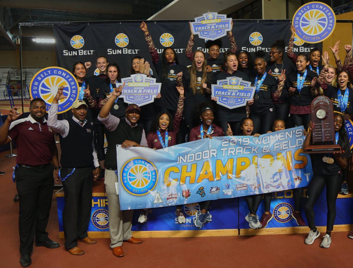 The Texas State women’s track team and coaches following the sun belt Conference Championship win.Courtesy photo by Texas State Athletics.