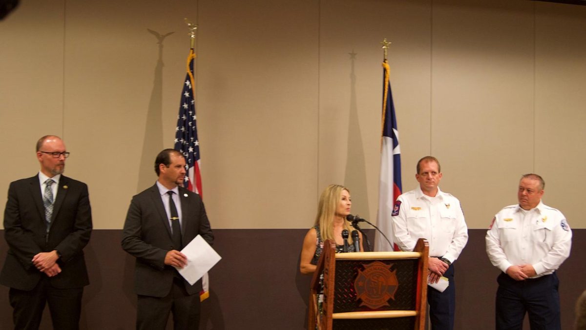 Kristy Stark, director of communications for the City of San Marcos, introduced the speakers at the press conference addressing the reward for the Iconic Village apartment fire on Aug. 2.