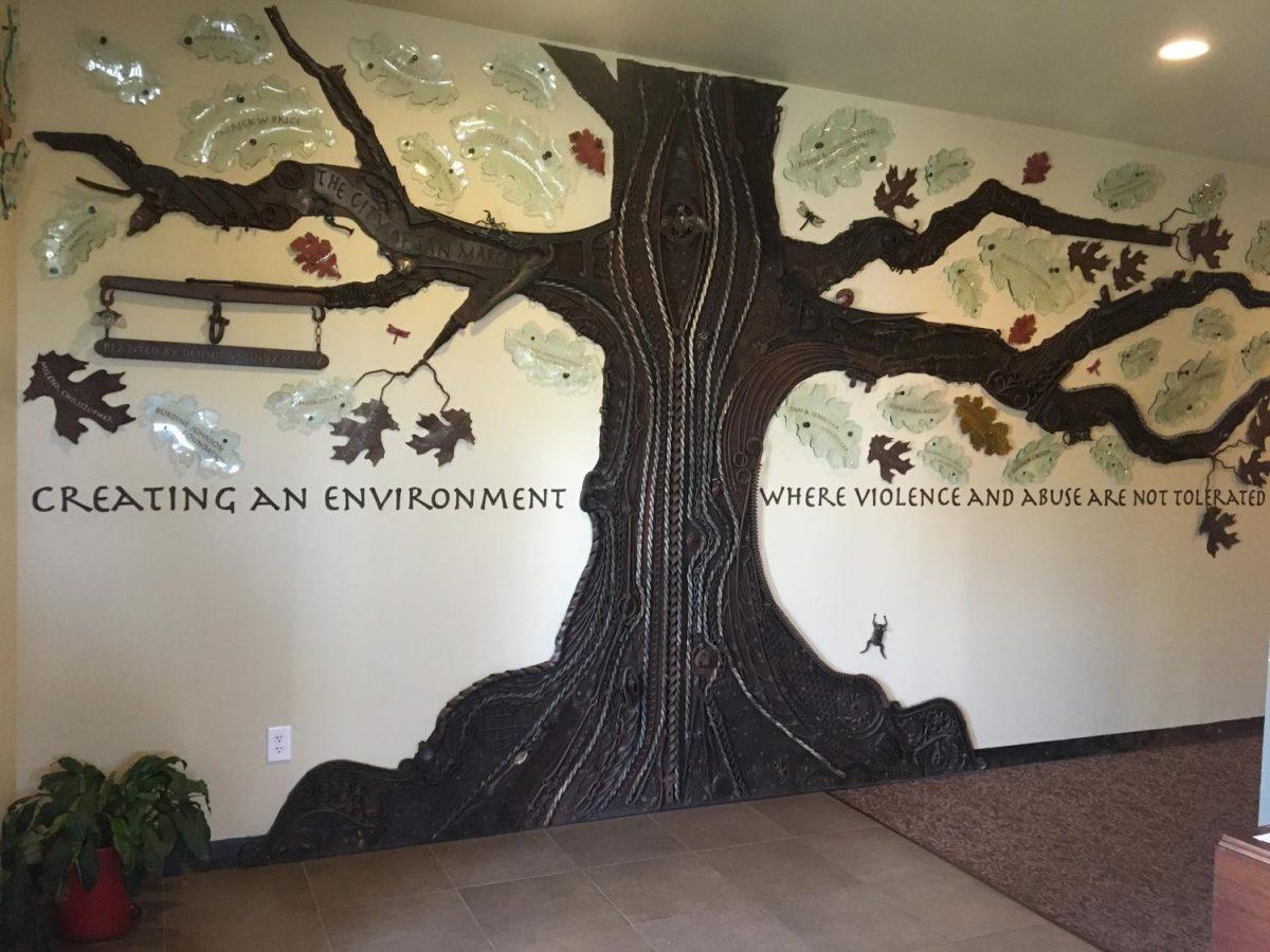 Artwork at the Hays-Caldwell Women’s Center portraying names of people and organizations who donated to the cause. “Creating an environment where violence and abuse are not tolerated in our community” Photo credit: Daniel Weeks