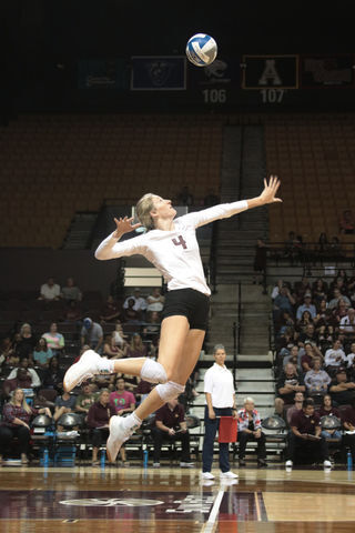 Texas State setter and outside hitter Cheyenne Huskey serves a volleyball, Sunday, Sept. 29, 2019, in a game vs. the University of Louisiana-Monroe at Strahan Arena. [Photo by Katelyn Lester]