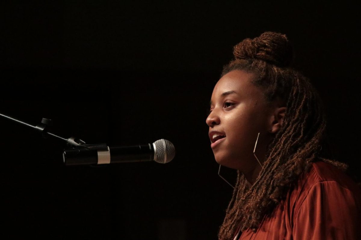 <p>Amani Seay speaks on her feelings about the racial climate of Texas State during her freshman year Oct. 17 at the Star Stories event at the Performing Arts Center.</p>