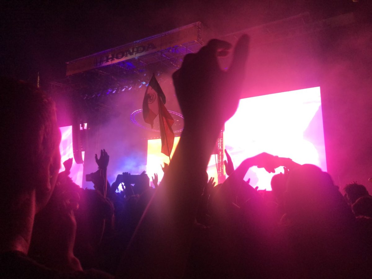 Tame Impala fans raise their hands to the song “Apocalypse Dreams.”