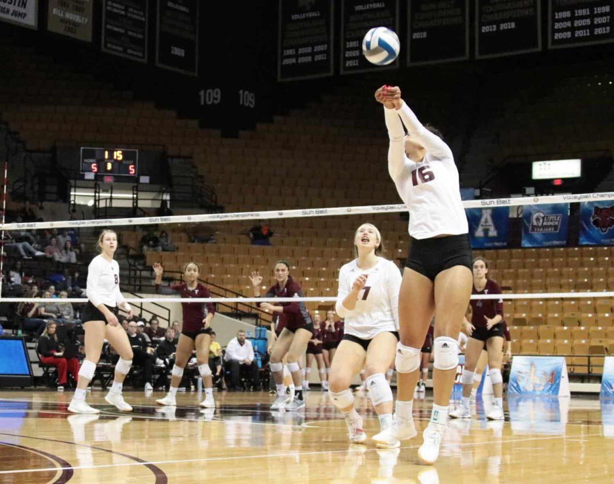 Sophomore outside hitter Janell Fitzgerald bumps the ball to keep it in play Nov. 23 at Strahan Arena.