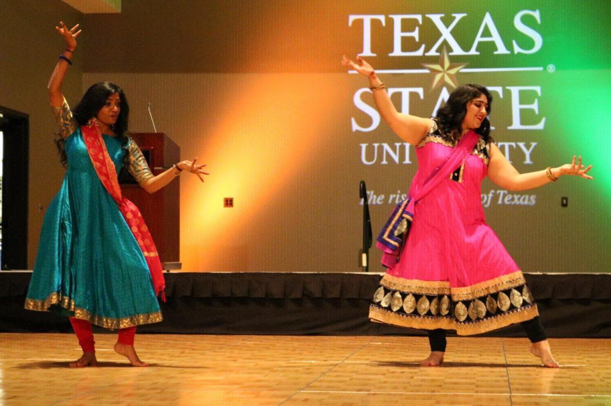Neeharika Tipparaju (left) and Karina Harchandani (right) dancing a duet performance for Diwali celebration Nov. 16 in LBJ Ballroom. Photo credit: Abby Gutierrez