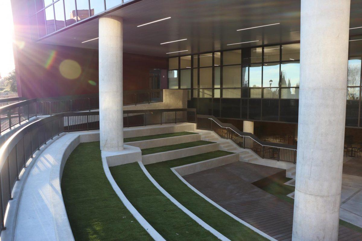 Rebecca HarrellThe outdoor amphitheater stands in its original space leading down to the first floor of the student center complete with a center boardwalk level, artificial grass and surrounded by an accessible ramp.