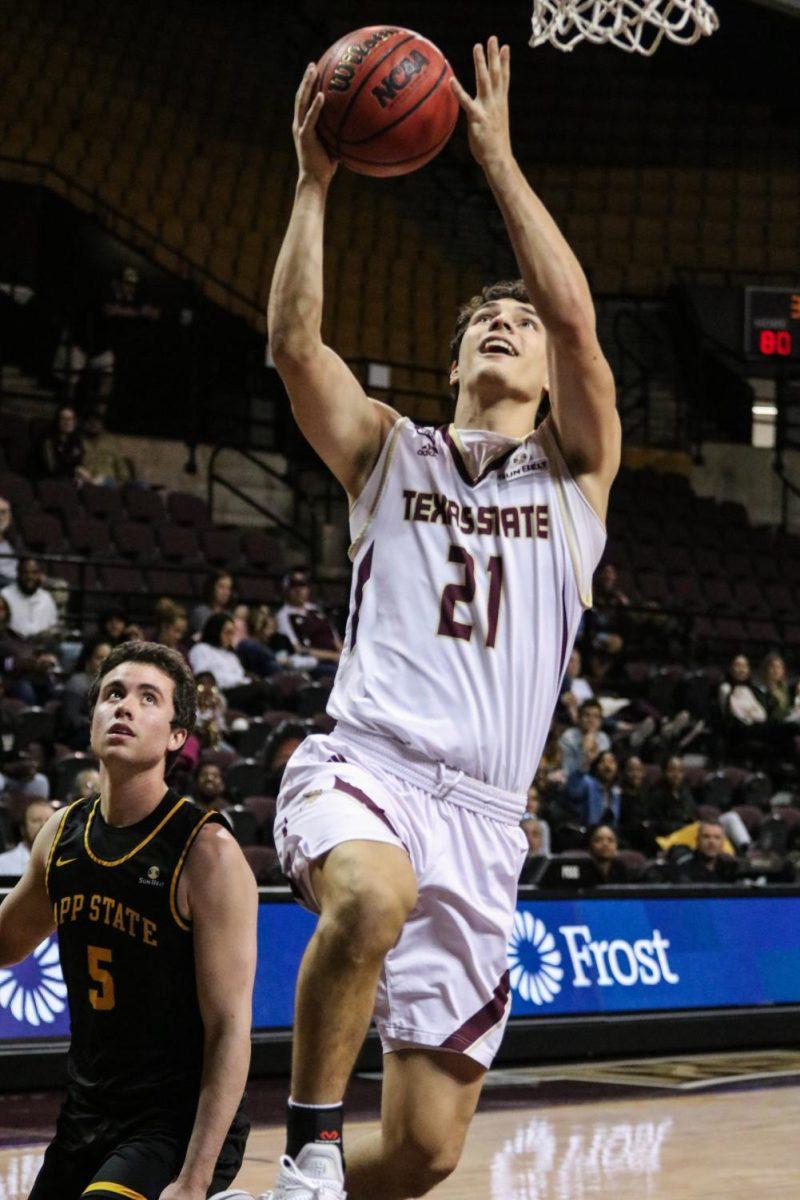 Texas State junior guard Garrett Shaw goes up for a layup and scores in the final seconds of the Bobcats’ game against Appalachian State, Saturday, Jan. 11, 2019, at Strahan Arena.
