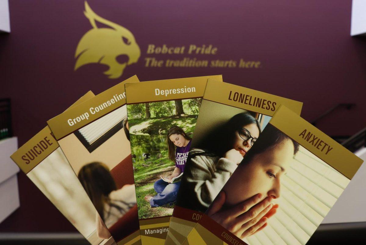 Pamphlets pertaining to mental health services for Texas State students are offered outside of the Counseling Center, Friday, Jan. 17, 2020, inside of the LBJ Student Center.