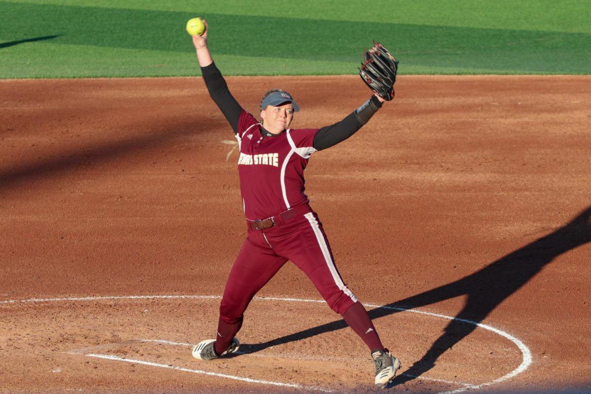 Texas State freshman pitcher Tori McCann winds up to pitch to a Saint Louis batter during the first inning of a game, Friday, Feb. 14, 2020, at Bobcat Softball Stadium.