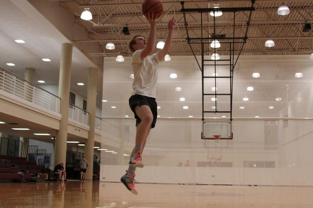Texas State student Nick Waples practices his layup, Thursday, Feb. 21, 2020, at the Student Recreation Center.