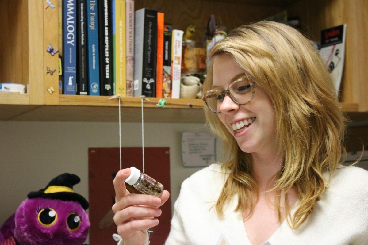 Texas State Graduate student Bria Marty holds a preserved spider, Friday, Feb. 21, 2020, at the Science Greenhouse.