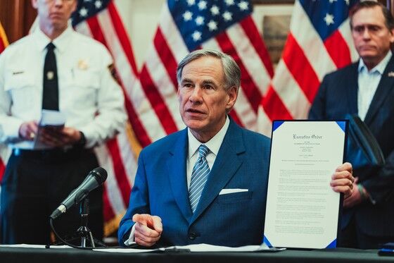 A photo of The Texas Governor in his office 3/26/2020. Courtesy image from Governor’s office.