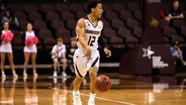 Sophomore guard Mason Harrell dribbles down the court in the final regular-season game against South Alabama on Wednesday, March 3, 2020. Photo courtesy of Texas State Athletics.