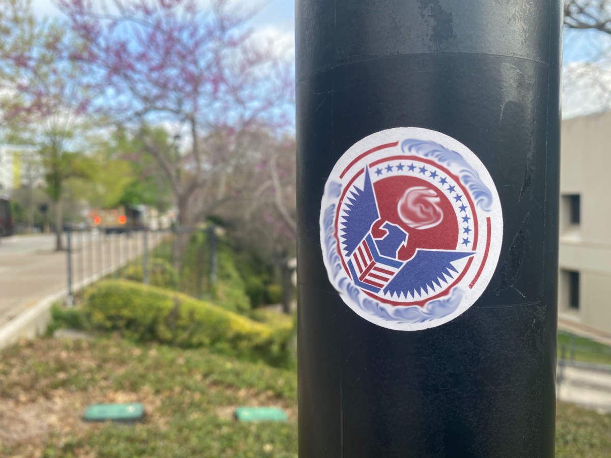 Edited image removing the white supremest organization’s name from one of the stickers found on Monday, March 13, 2020, on Texas State Univerity’s campus by the bus loop.Edit: Chase Rogers