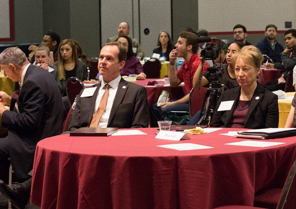 Texas State Provost Gene Bourgeois (left) and President Denise Trauth listen intently during a panel held at the Transitions in American Democracy Symposium in 2017.