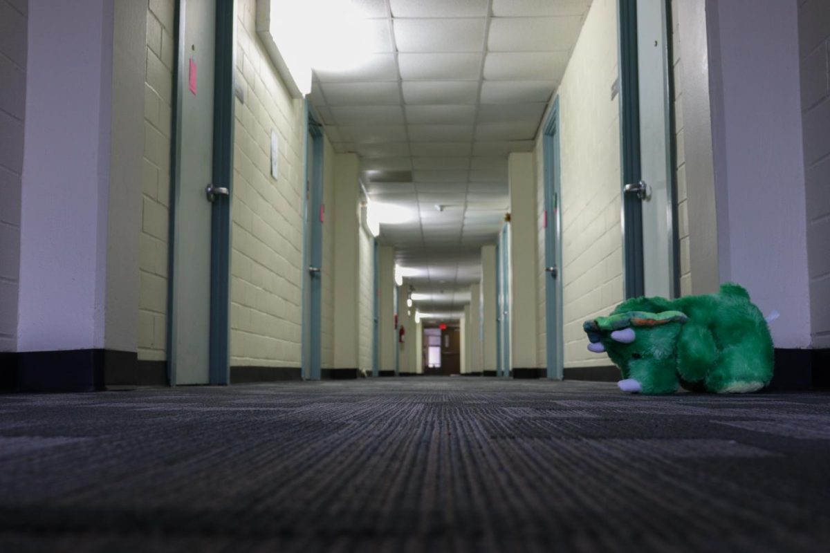 An abandoned stuffed animal sits at the end of a dormitory hallway, Monday, March 30, 2020, in Lantana Hall on Texas State’s campus.