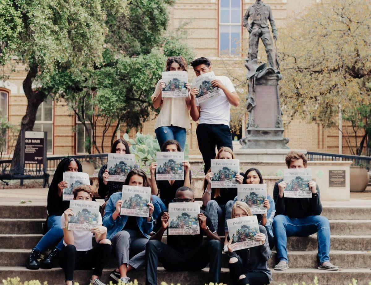 The Star’s 2019-20 fall semester editorial board poses for a portrait outside of Old Main at Texas State.