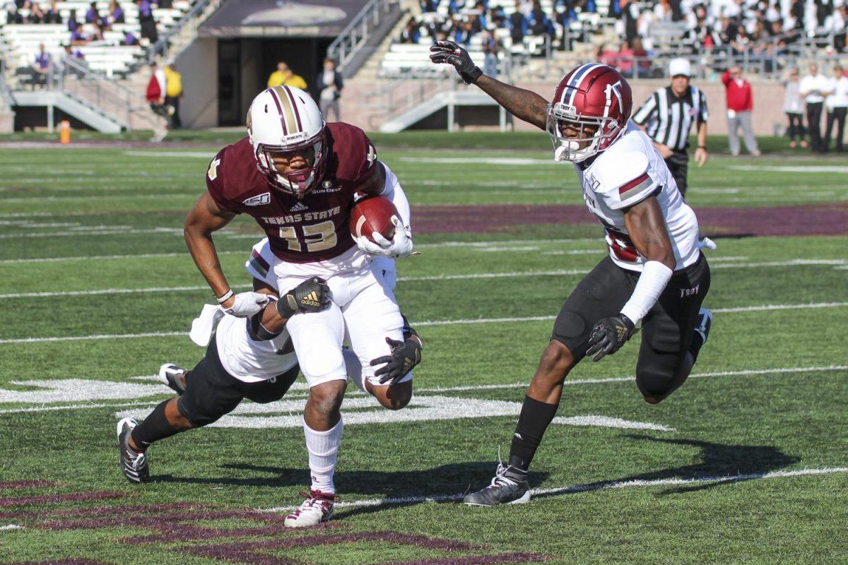 Wide receiver Trevis Graham Jr. runs with the ball at the Texas State football game vs. Troy, Saturday, Nov. 16, 2019, at Bobcat Stadium.
