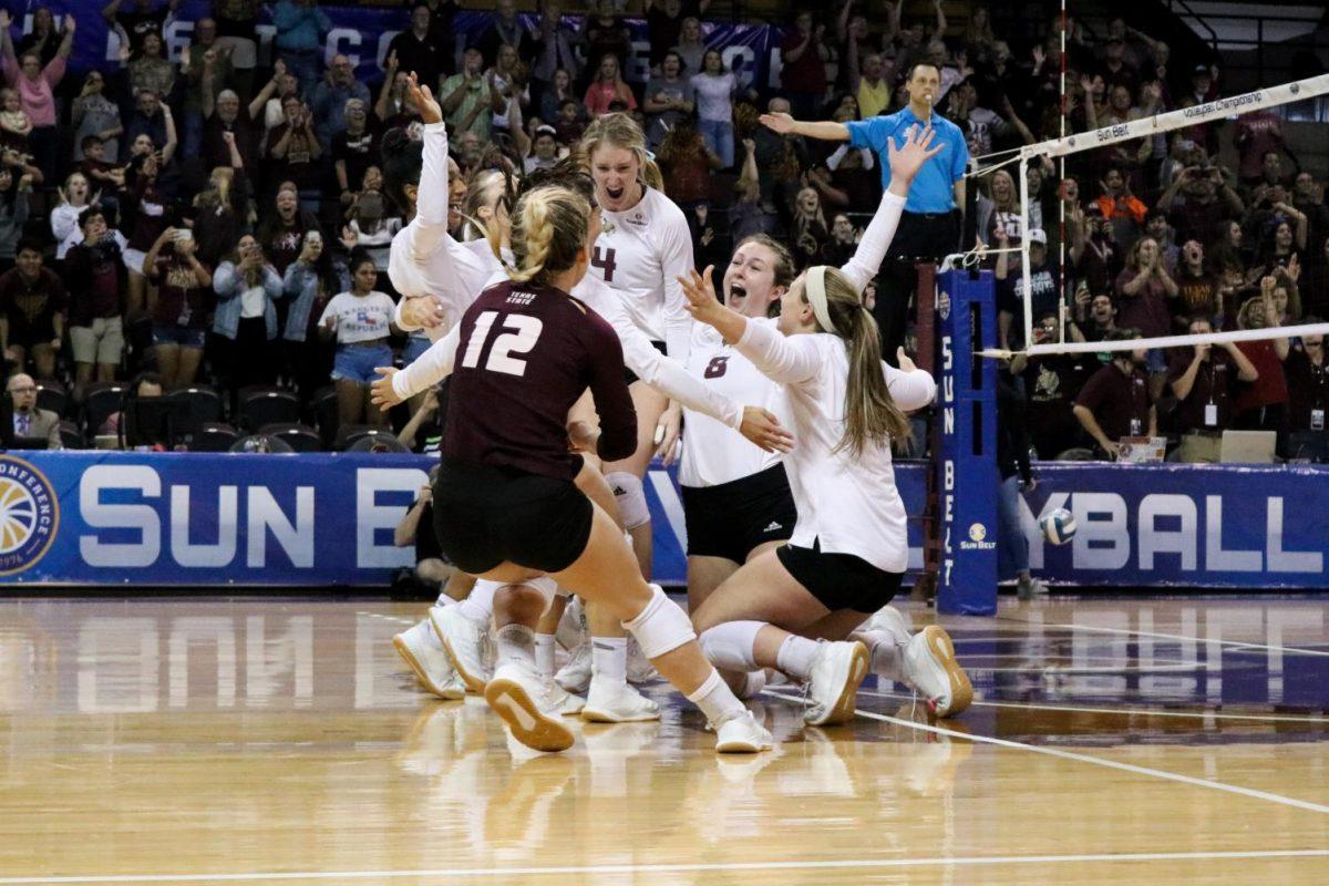 Texas+State+volleyball+players+celebrate+a+victory+against+Coastal+Carolina+to+win+the+Sunbelt+Conference+Championship%2C+Sunday%2C+Nov.+24%2C+2019%2C+at+Strahan+Arena.