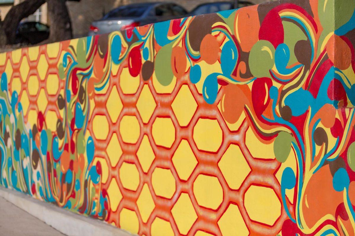 A colorful mural painted along North LBJ Drive. The City of San Marcos Mural Arts Program is requesting artist submissions for a commissioned public mural located on 297 CM Allen Parkway near the Children’s Park.