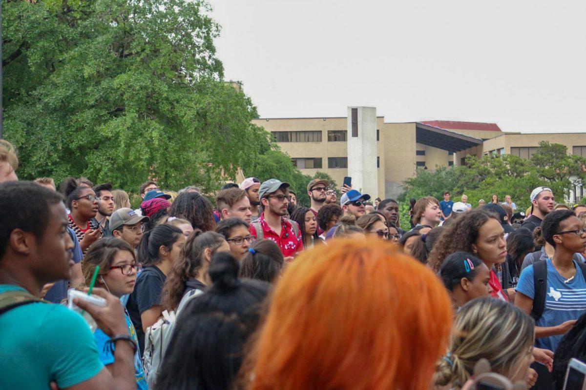 Protesters, onlookers and students listen to statements made by student activists, Wednesday, May 1, 2019, at Texas State. On that day, hundreds of students fled to Texas State’s Quad area after four students of color were arrested following an on-campus political clash. On Friday, July 24, 2020, Texas State hosted part one of its Restorative Justice Town Hall series—a three-part initiative aimed at providing opportunities for discussions on race, trans-generational trauma, justice and law enforcement.