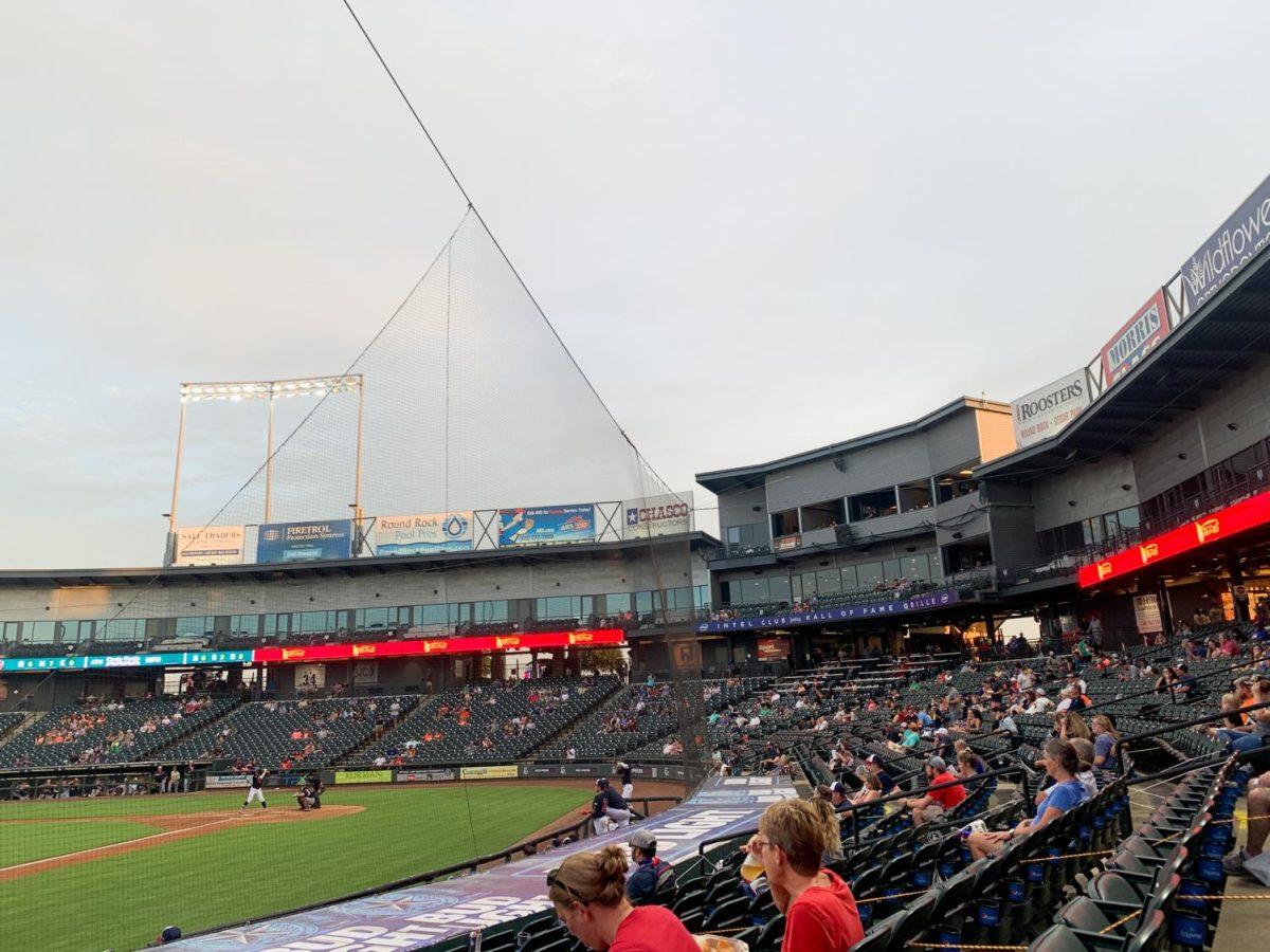 Crowds+at+the+Dell+Diamond+are+socially+distanced+with+certain+rows+marked+off+to+keep+the+stadium+below+25+percent+capacity%2C+Wednesday%2C+July+29%2C+2020%2C+in+Austin.+Fans+are+required+to+wear+masks+when+walking+around+the+stadium+and+not+in+their+seats.+%28Kate+Connors%29