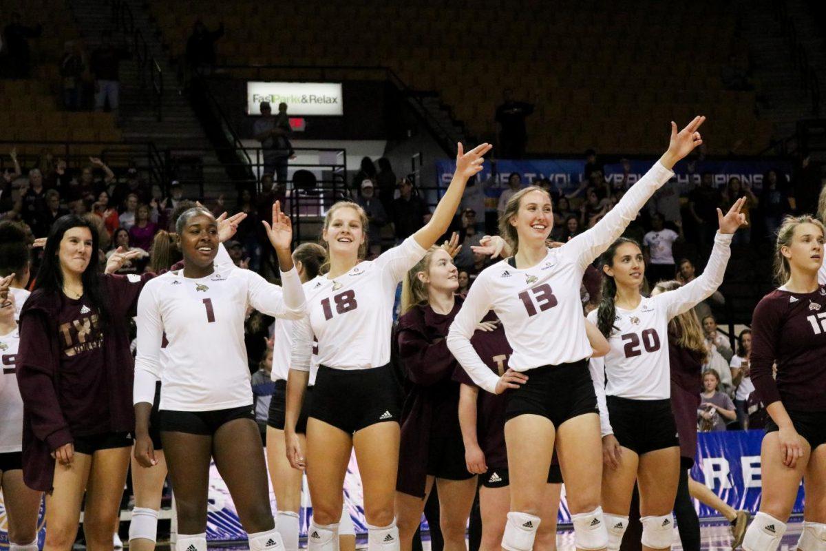 Texas State volleyball players sing the Texas State Fight Song after a victory against Coastal Carolina to win the Sunbelt Conference Championship Nov. 24 at Strahan Arena.