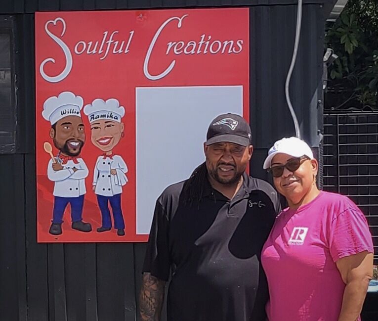 Willie Adams (left) stands with wife Ramika Adams (right) outside of their food truck, Soulful Creations, located off of Wonder World Drive in San Marcos.